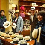 Spanish students trying on Panama Hats during a cultural field trip