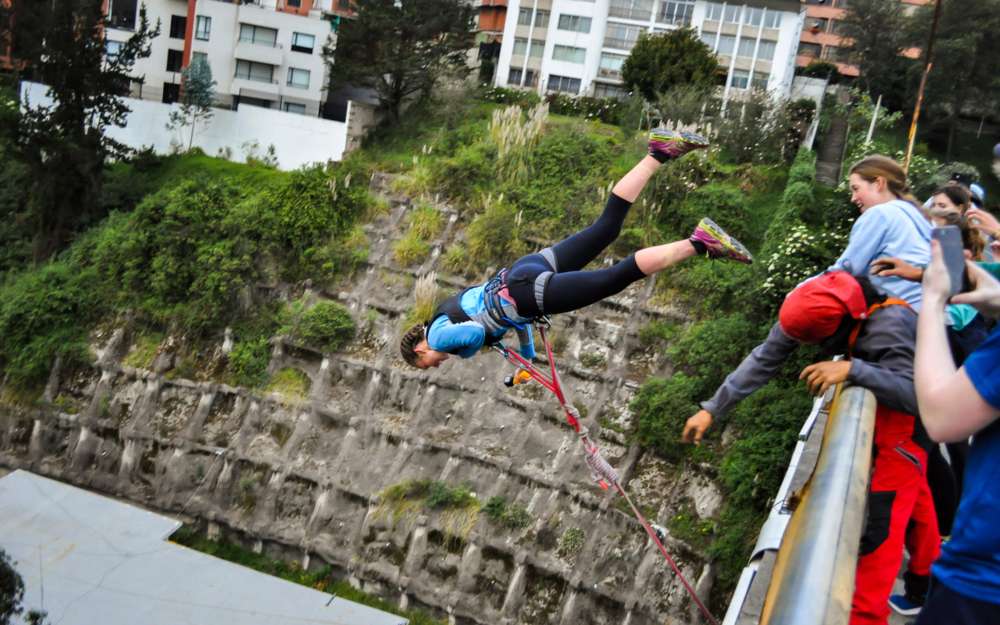 A courageous Spanish student gets thrown off of a bridge during Bungie Jumping activity