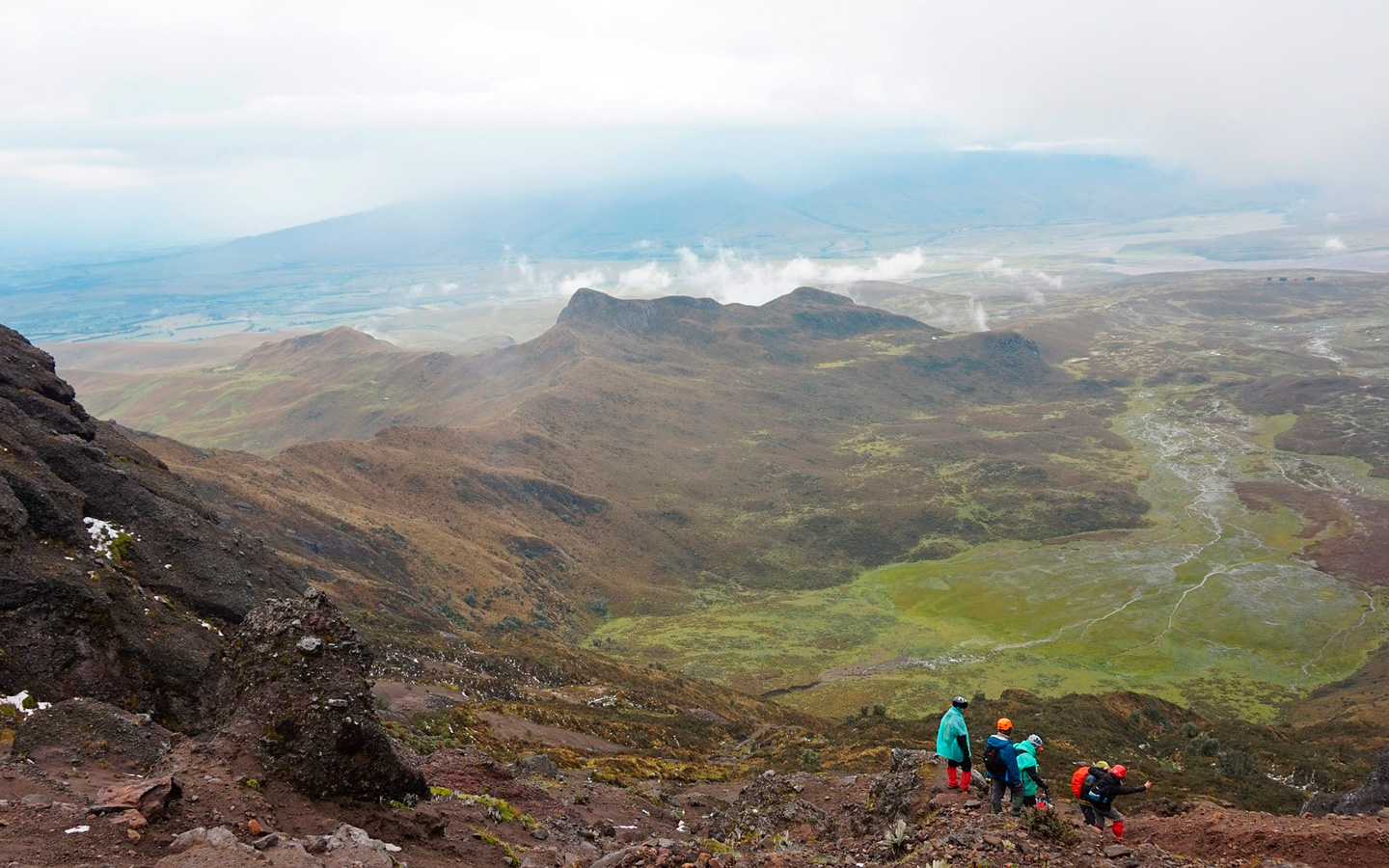 Students hiking down from the summit of Cotopaxi