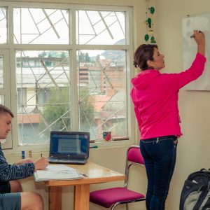 Ximena demonstrating Spanish teaching methods to a fellow Spanish teacher